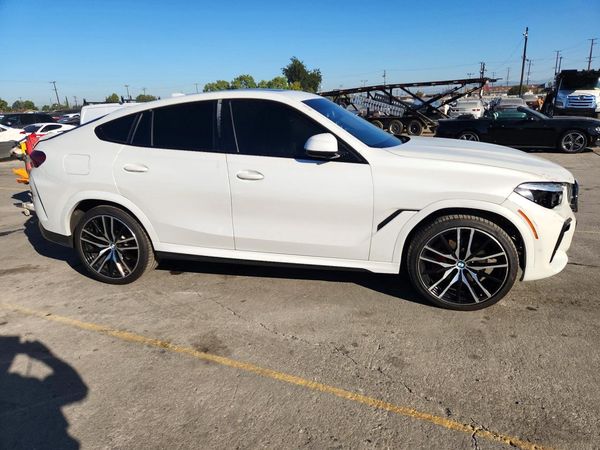2022 BMW X6 xDrive40i — Passenger 3/4