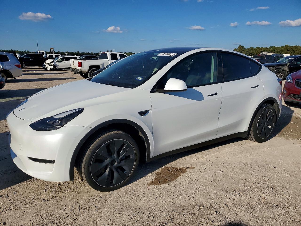 2025 TESLA MODEL Y — Front 3/4
