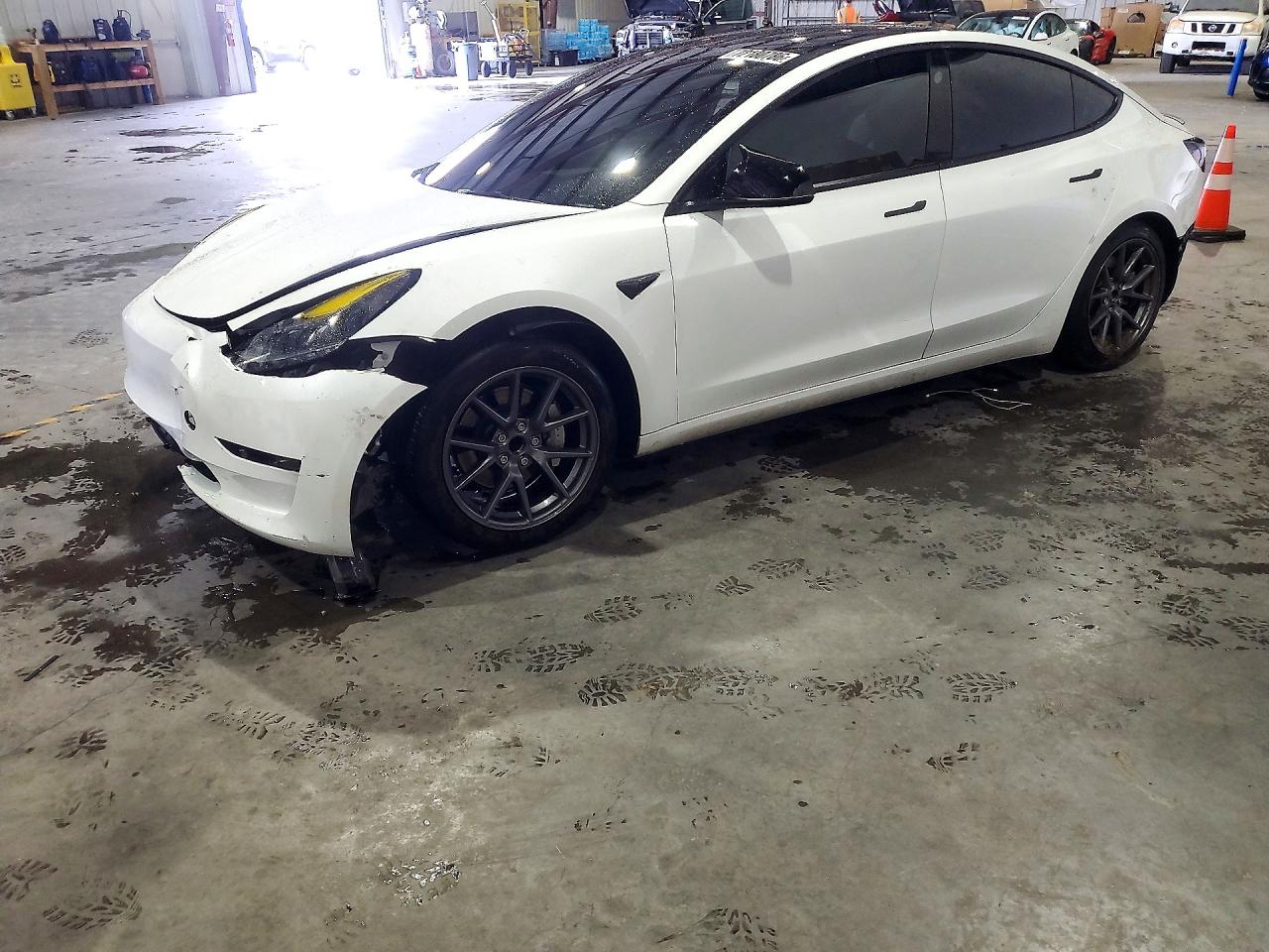 2023 TESLA MODEL 3 — Front 3/4