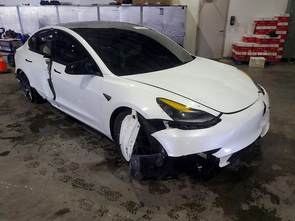 2023 TESLA MODEL 3 — Passenger 3/4