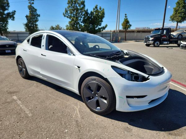 2023 TESLA MODEL 3 — Passenger 3/4