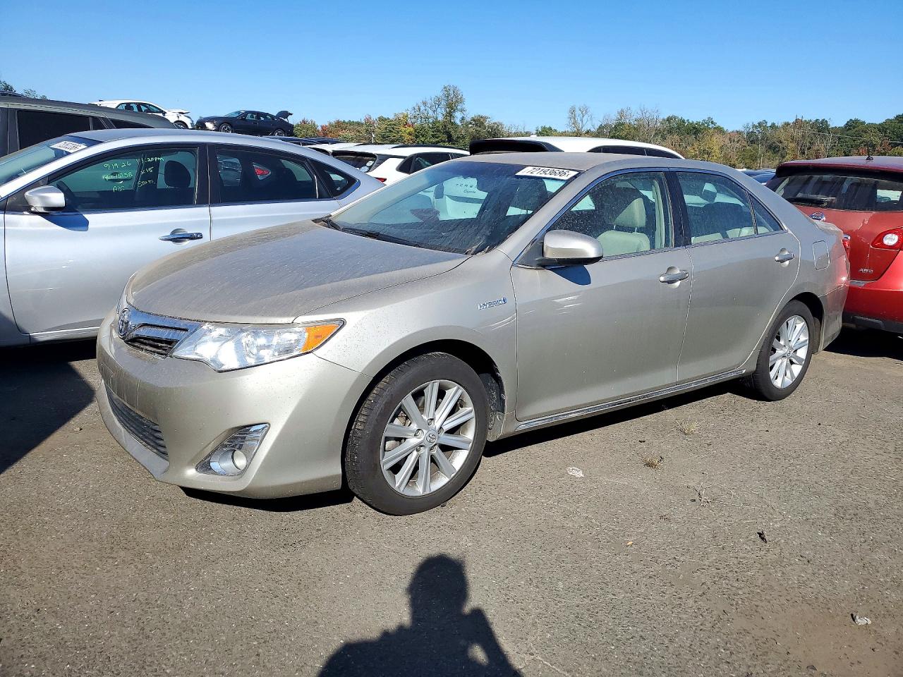 2014 TOYOTA CAMRY SOLA Hybrid — Front 3/4