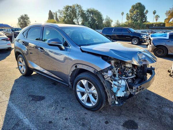 2017 LEXUS NX 300h Luxury — Passenger 3/4