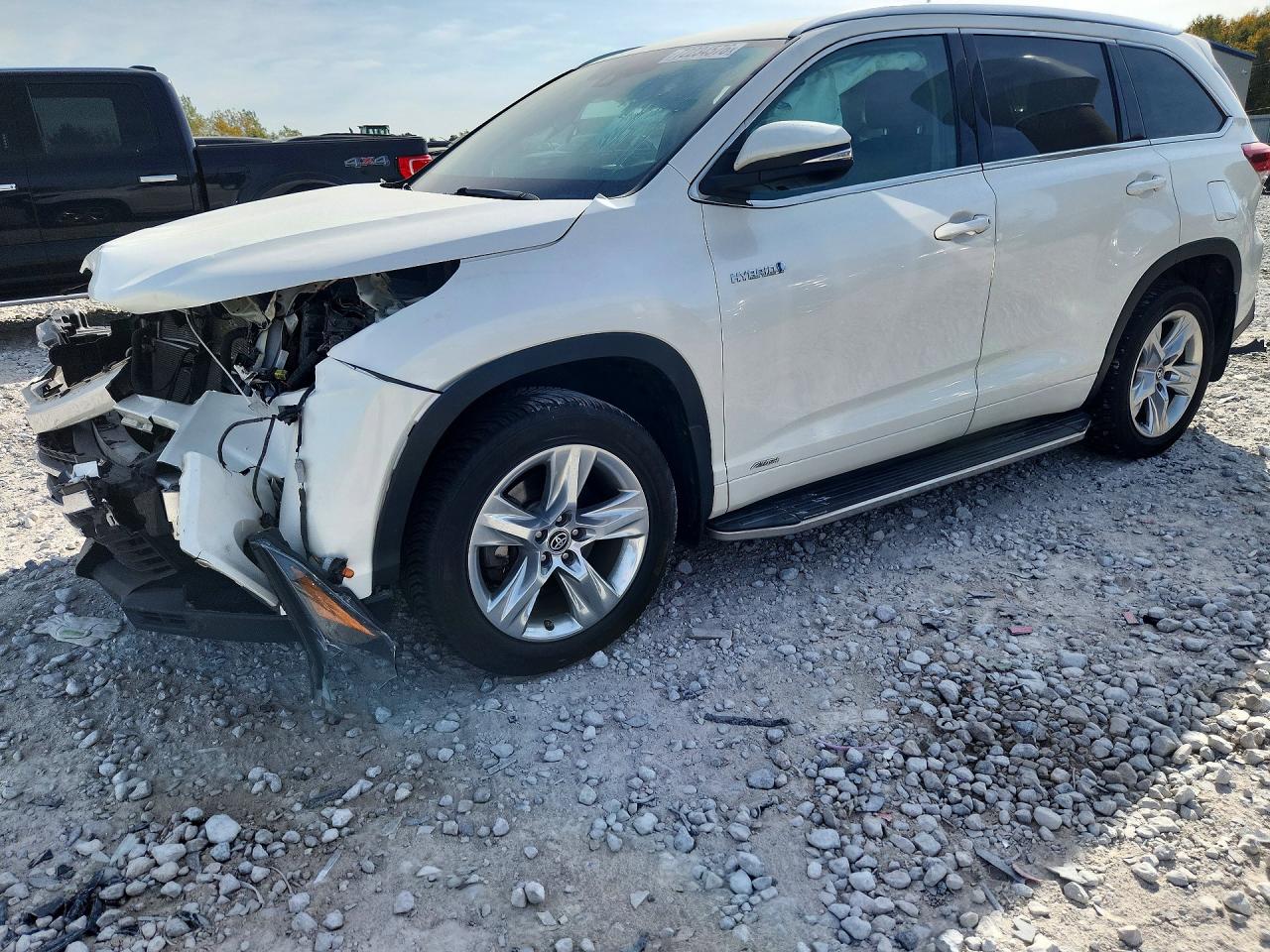2019 TOYOTA HIGHLANDER Ltd/Ltd Platinum Hybrid — Front 3/4