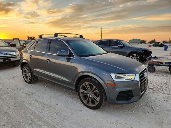 2017 AUDI Q3 Premium Plus — Passenger 3/4