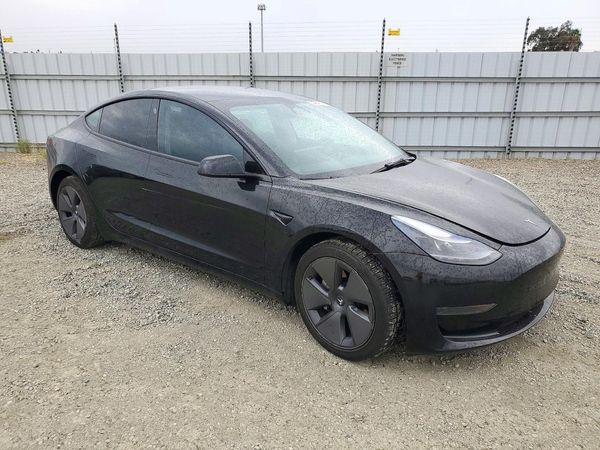 2023 TESLA MODEL 3 — Passenger 3/4