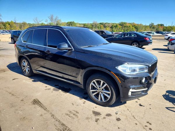 2014 BMW X5 xDrive35i — Passenger 3/4
