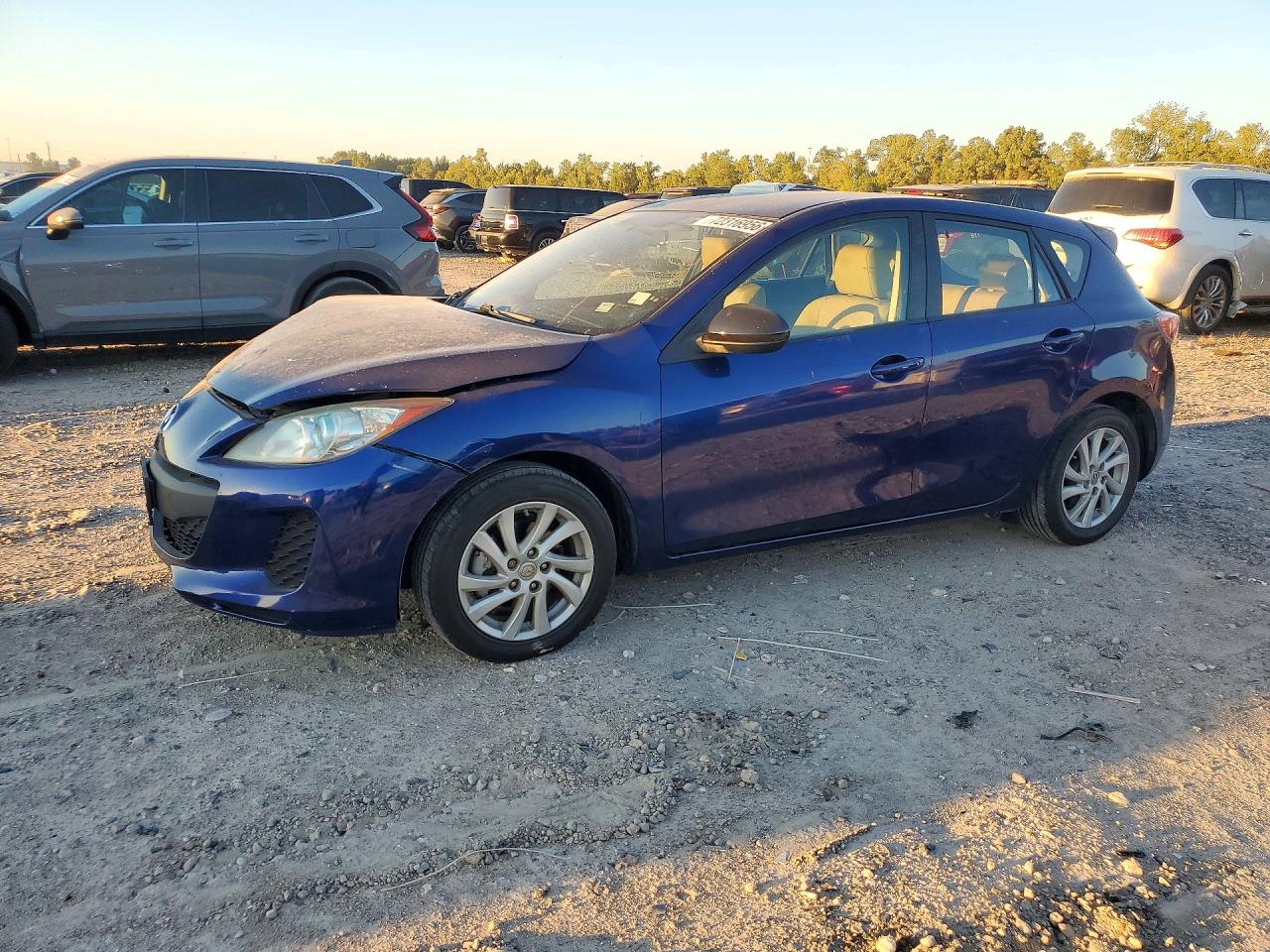 2012 MAZDA 3 Touring/GS — Front 3/4