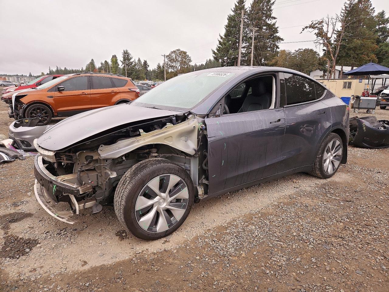 2023 TESLA MODEL Y — Front 3/4