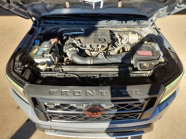 2023 NISSAN FRONTIER Crew Cab — Engine bay