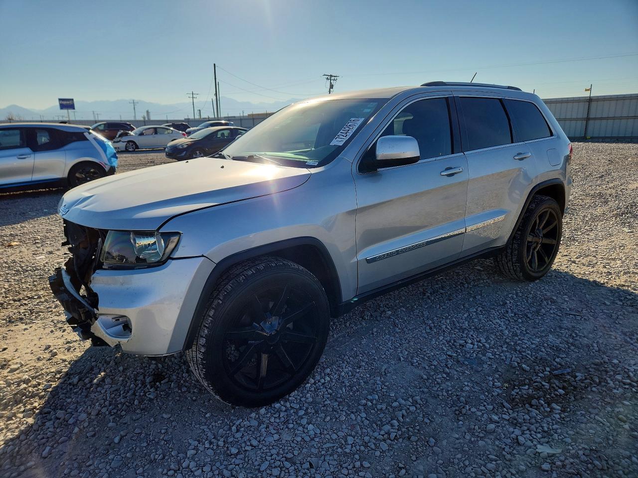 2012 JEEP CHEROKEE Laredo — Front 3/4