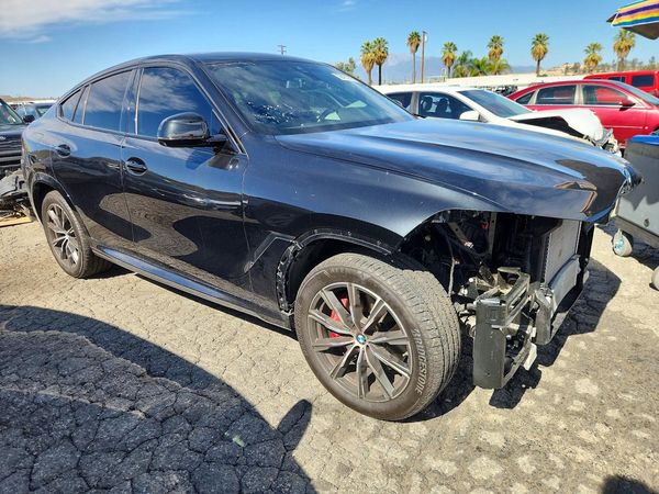 2023 BMW X6 xDrive40i — Passenger 3/4