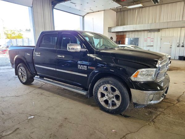 2015 RAM 1500 Laramie — Passenger 3/4