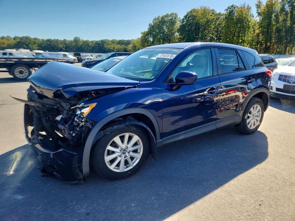 2014 MAZDA CX-5 Touring/GS — Front 3/4