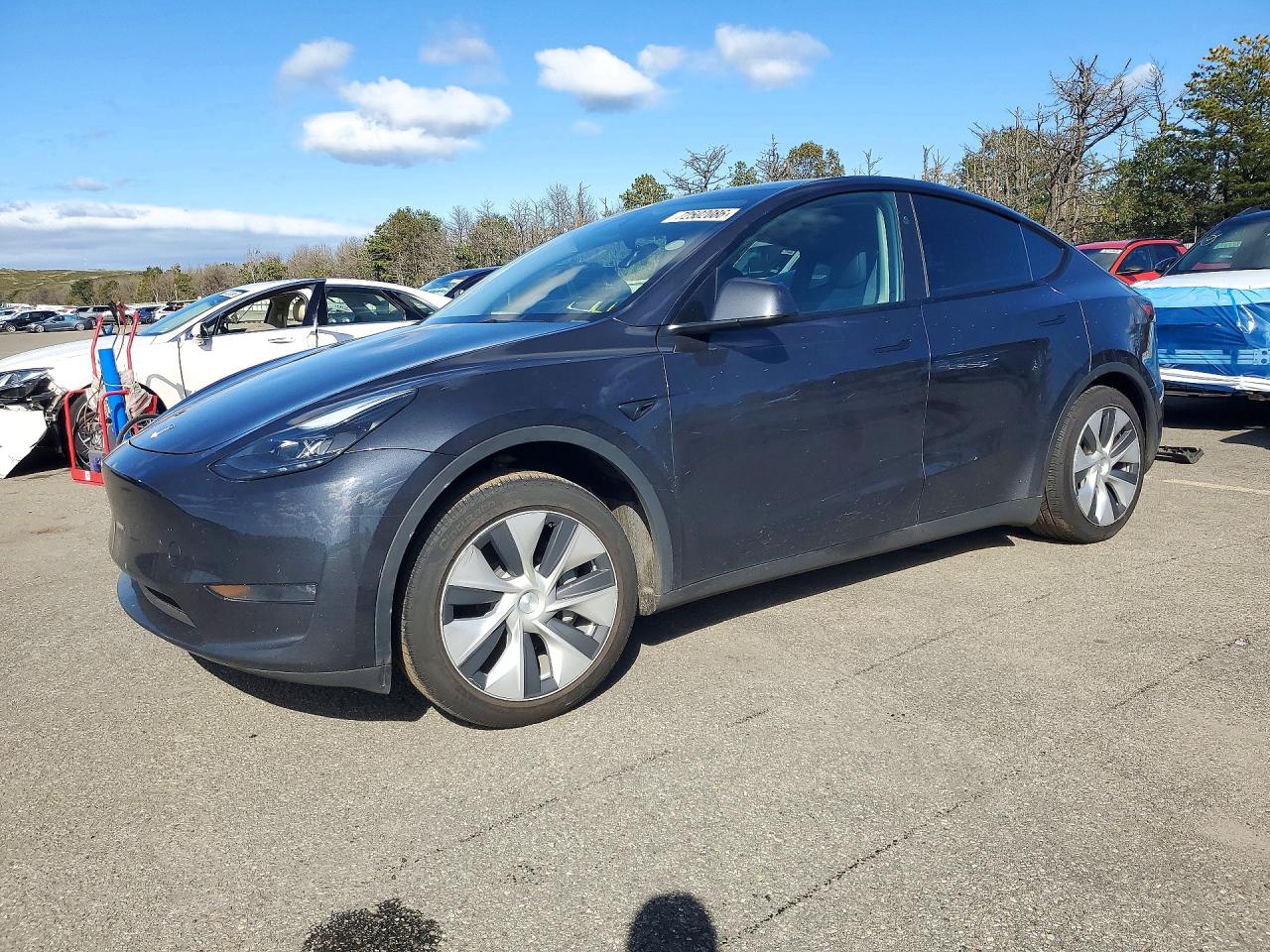 2024 TESLA MODEL Y — Front 3/4