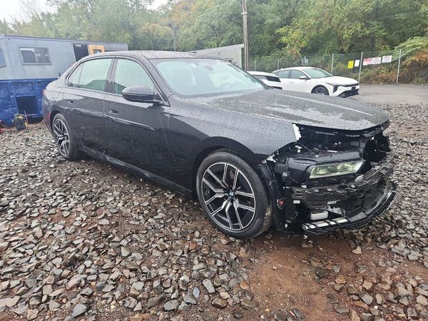 2026 BMW 740 xDrive — Passenger 3/4