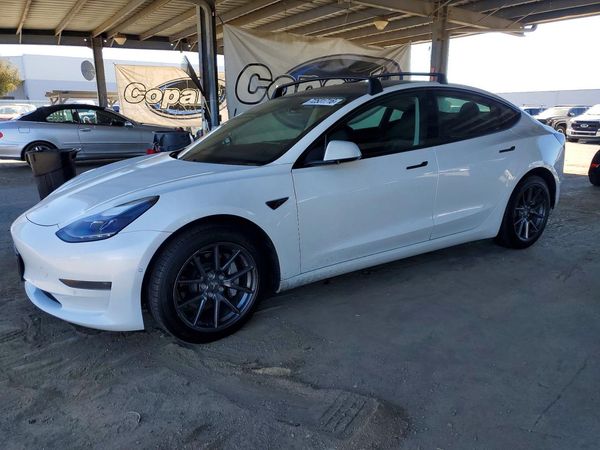 2021 TESLA MODEL 3 — Front 3/4