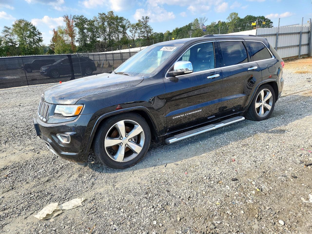 2016 JEEP GRAND CHEROKEE Overland — Front 3/4