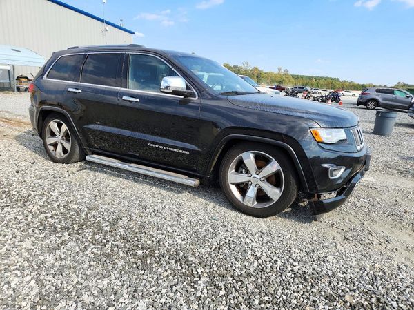 2016 JEEP GRAND CHEROKEE Overland — Passenger 3/4