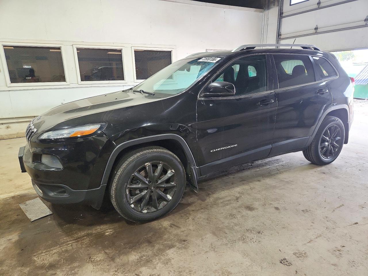 2014 JEEP CHEROKEE Limited — Front 3/4