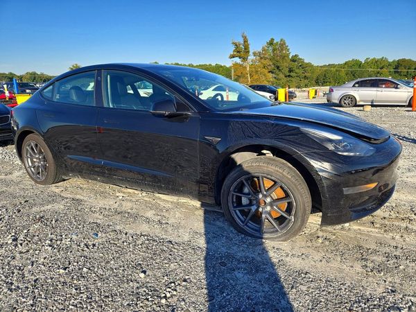 2023 TESLA MODEL 3 — Passenger 3/4