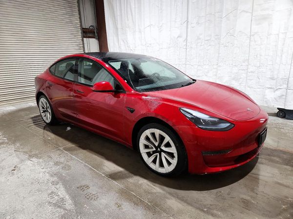 2023 TESLA MODEL 3 — Passenger 3/4