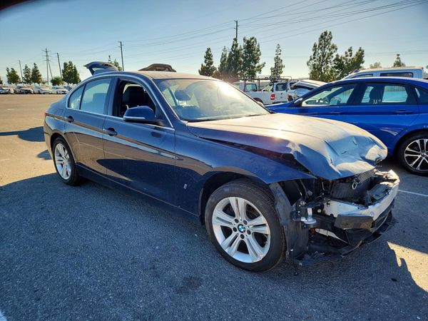 2017 BMW 330E — Passenger 3/4