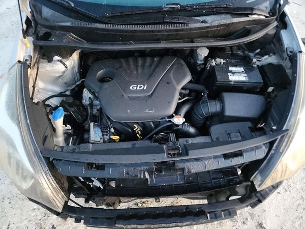 2014 KIA RIO 1.6 AT LX STD/Power — Engine bay