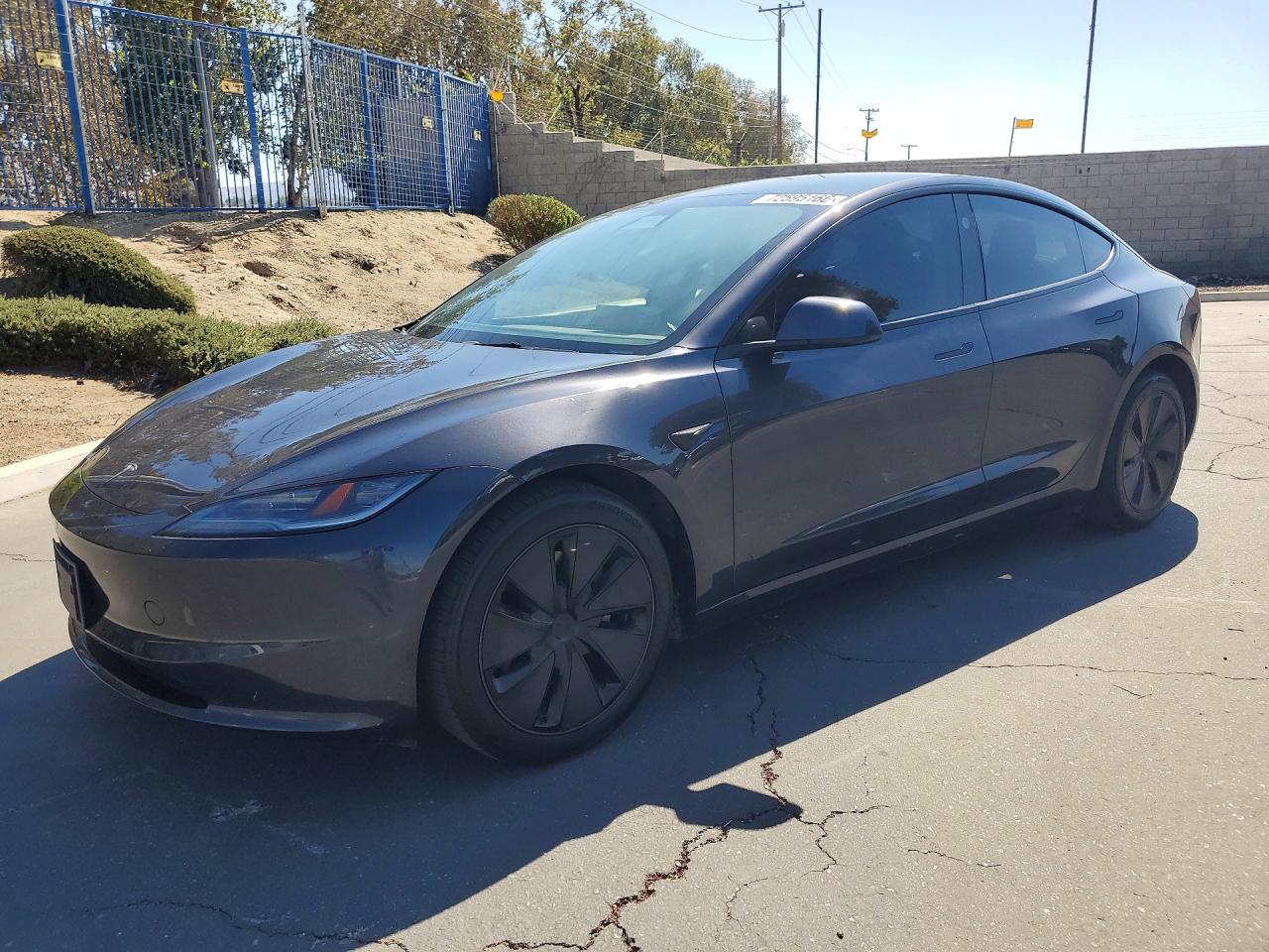 2024 TESLA MODEL 3 — Front 3/4