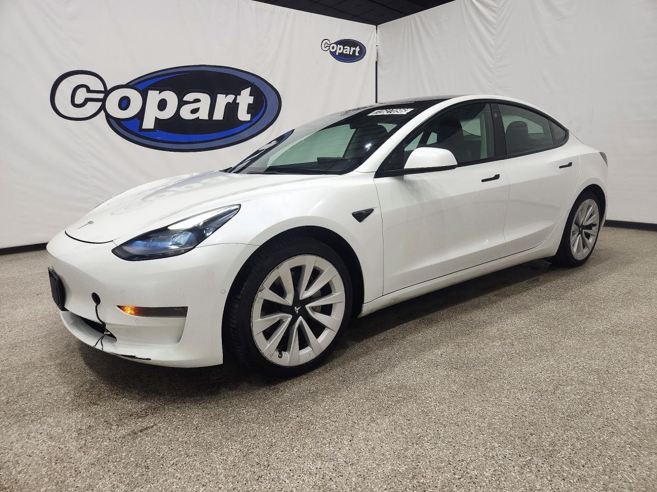2022 TESLA MODEL 3 — Front 3/4