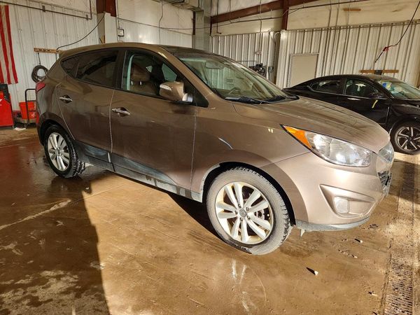 2013 HYUNDAI TUCSON — Passenger 3/4