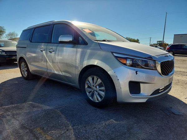 2016 KIA SEDONA LX - Middle-low — Passenger 3/4