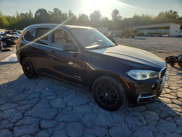 2014 BMW X5 xDrive35i — Passenger 3/4