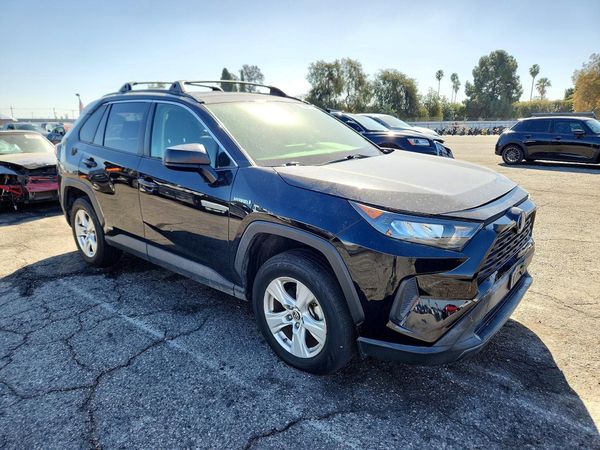 2019 TOYOTA RAV4 LE HV 4WD — Passenger 3/4
