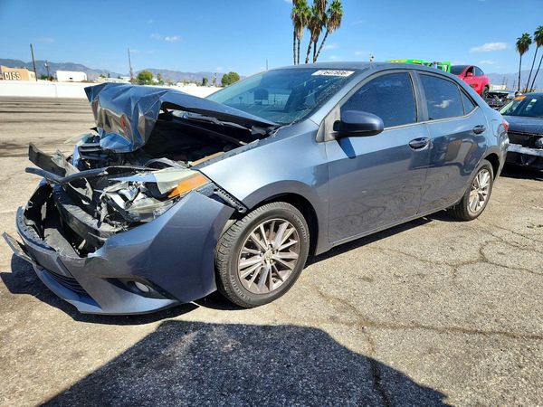 2014 TOYOTA COROLLA L/LE — Front 3/4