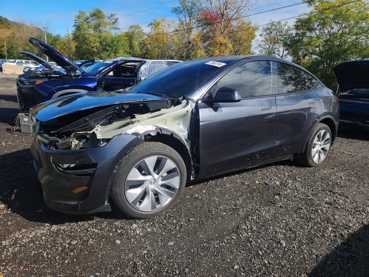 2026 TESLA MODEL Y — Front 3/4