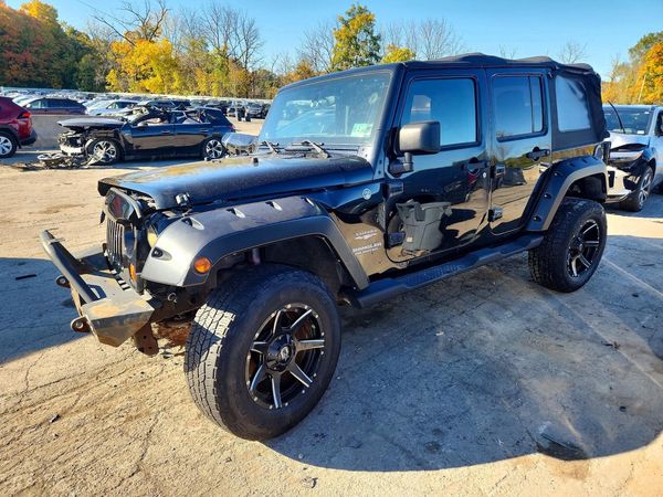 2012 JEEP WRANGLER Sahara — Front 3/4