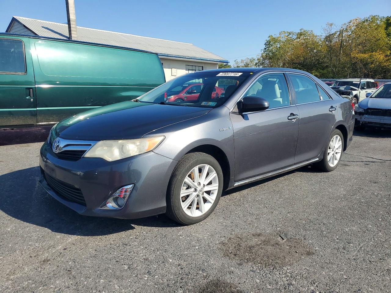 2012 TOYOTA CAMRY SOLA Hybrid — Front 3/4