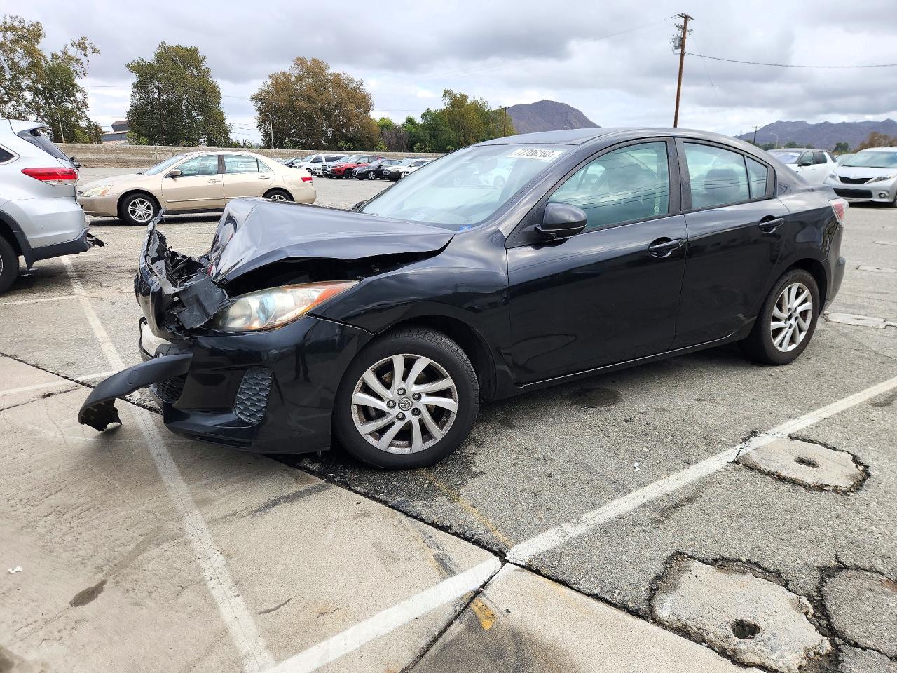 2012 MAZDA 3 Touring/GS — Front 3/4
