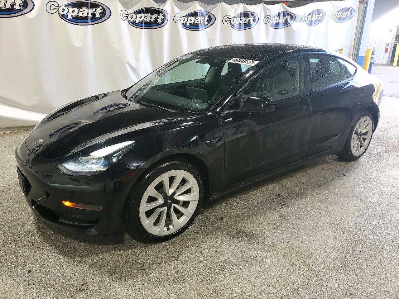 2023 TESLA MODEL 3 — Front 3/4