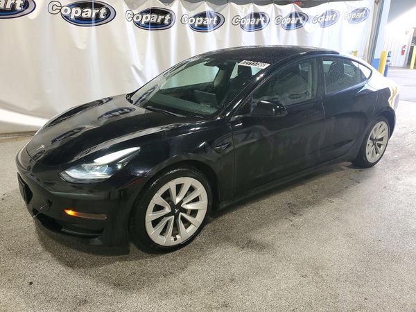 2023 TESLA MODEL 3 — Front 3/4
