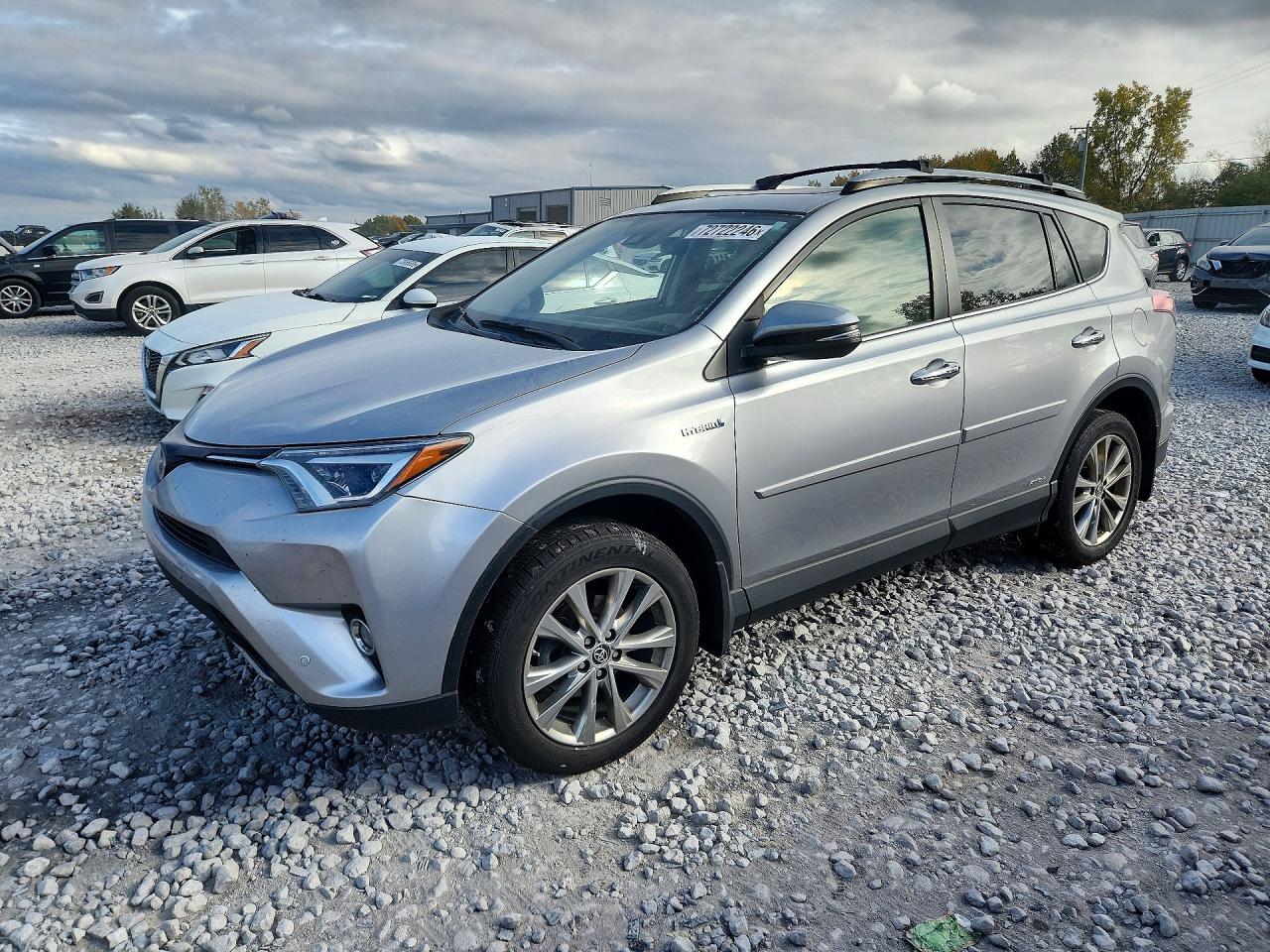 2017 TOYOTA RAV4 Ltd Hybrid — Front 3/4