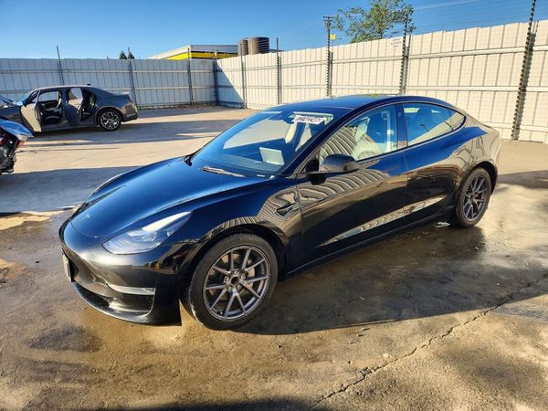 2022 TESLA MODEL 3 — Front 3/4