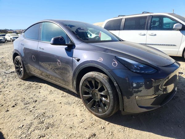 2023 TESLA MODEL Y — Passenger 3/4
