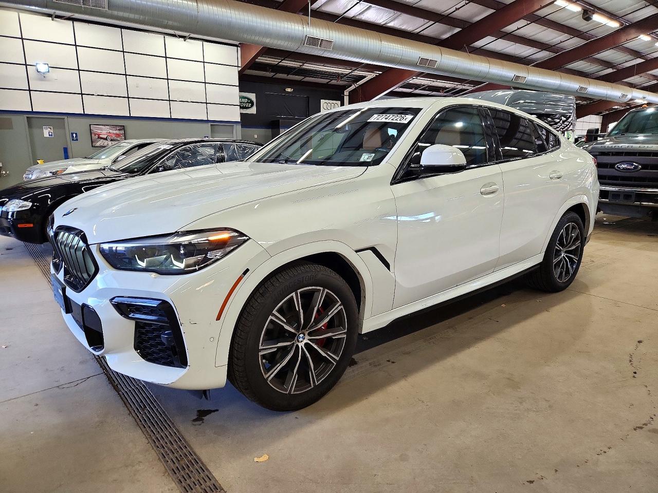 2022 BMW X6 xDrive40i — Front 3/4