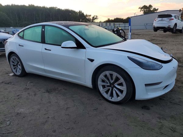 2023 TESLA MODEL 3 — Passenger 3/4