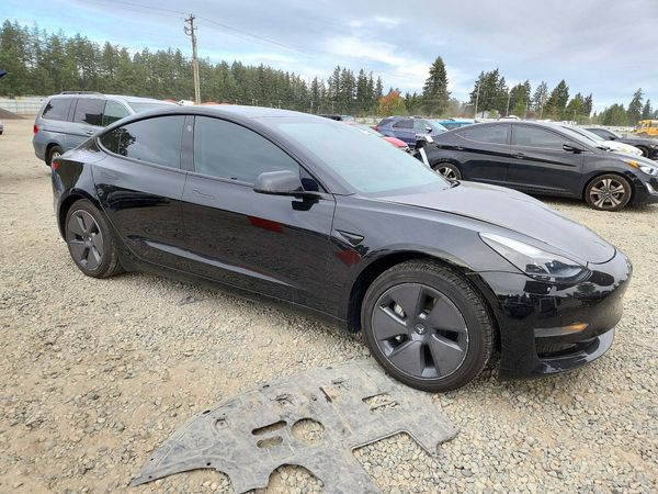 2023 TESLA MODEL 3 — Passenger 3/4
