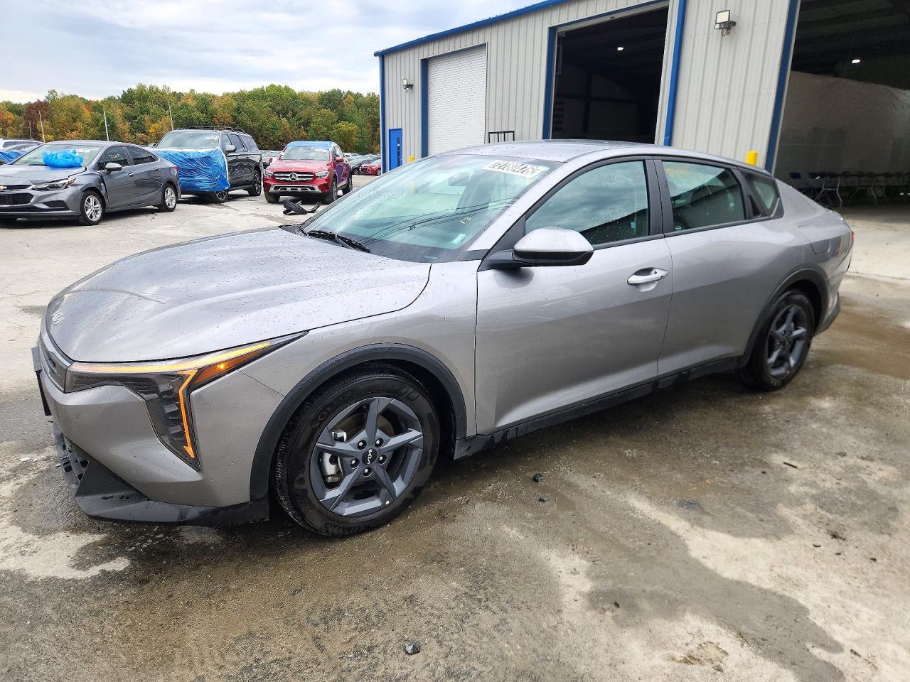 2026 KIA K4 LX, LXS — Front 3/4