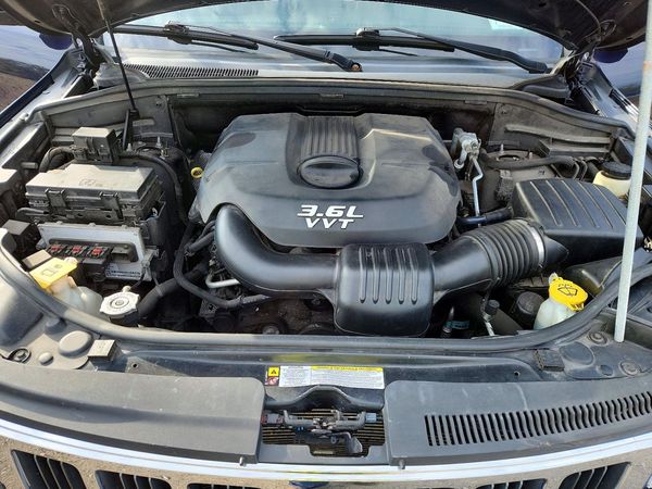 2013 JEEP GRAND CHER OKEE LAREDO 4X4 — Engine bay