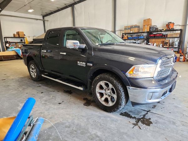 2018 RAM 1500 Laramie — Passenger 3/4